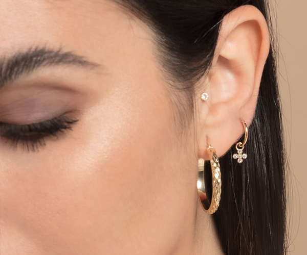 aros dorados mujer